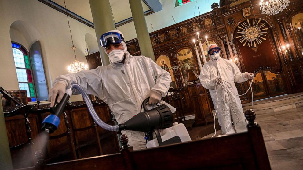 PHOTO: Workers of Istanbul's Metropolitan Municipality disinfect the Panagia Altimermer Orthodox Greek Church in Istanbul to prevent the spread of the COVID-19, caused by the novel coronavirus, March 15, 2020.