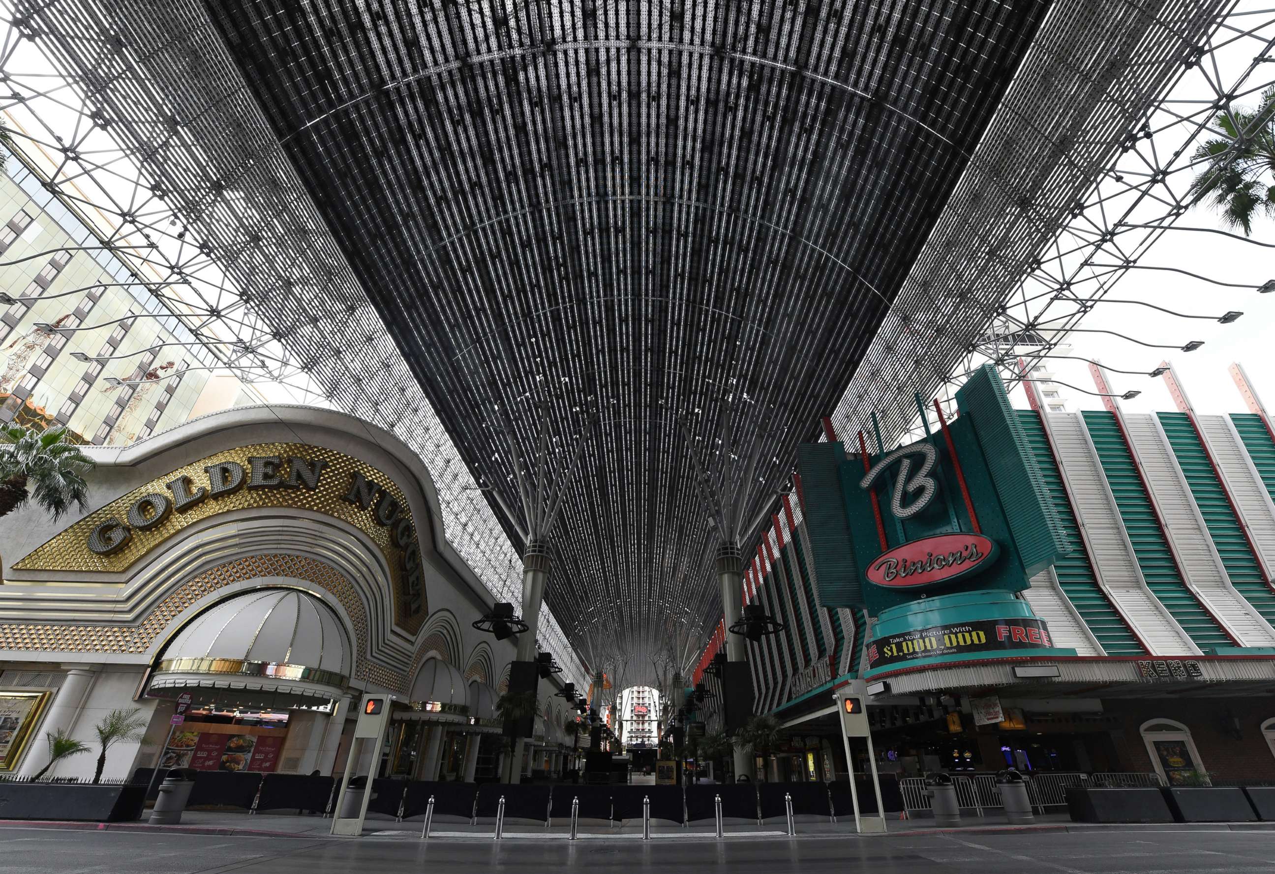 PHOTO: The Golden Nugget Hotel & Casino and Binions Gambling Hall & Hotel are blocked off as a result of the statewide shutdown due to the continuing spread of the coronavirus, March 22, 2020, in Las Vegas.