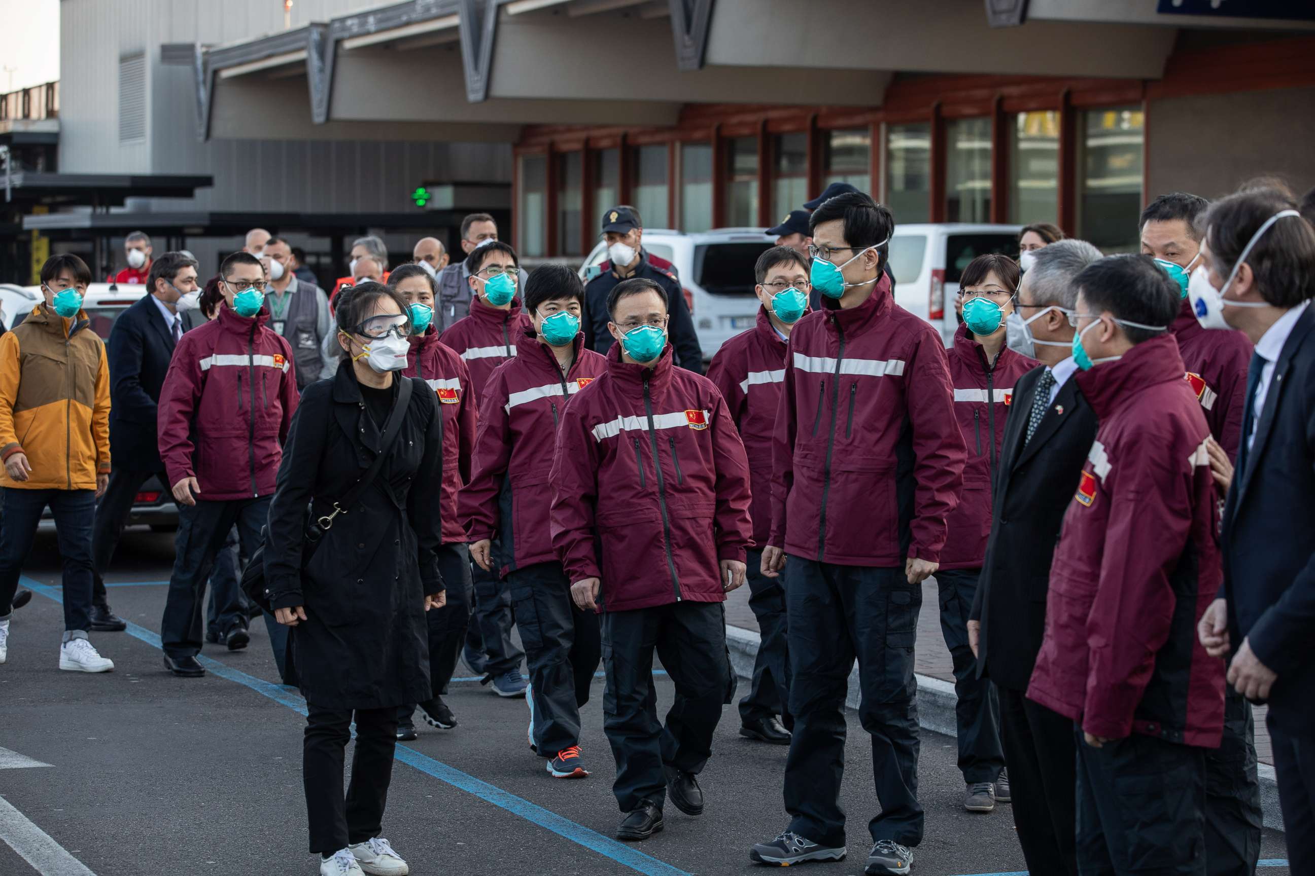PHOTO: Members of a Chinese medical team gather to attend a press conference after flying to the airport in Ferno, Italy, March 18, 2020.