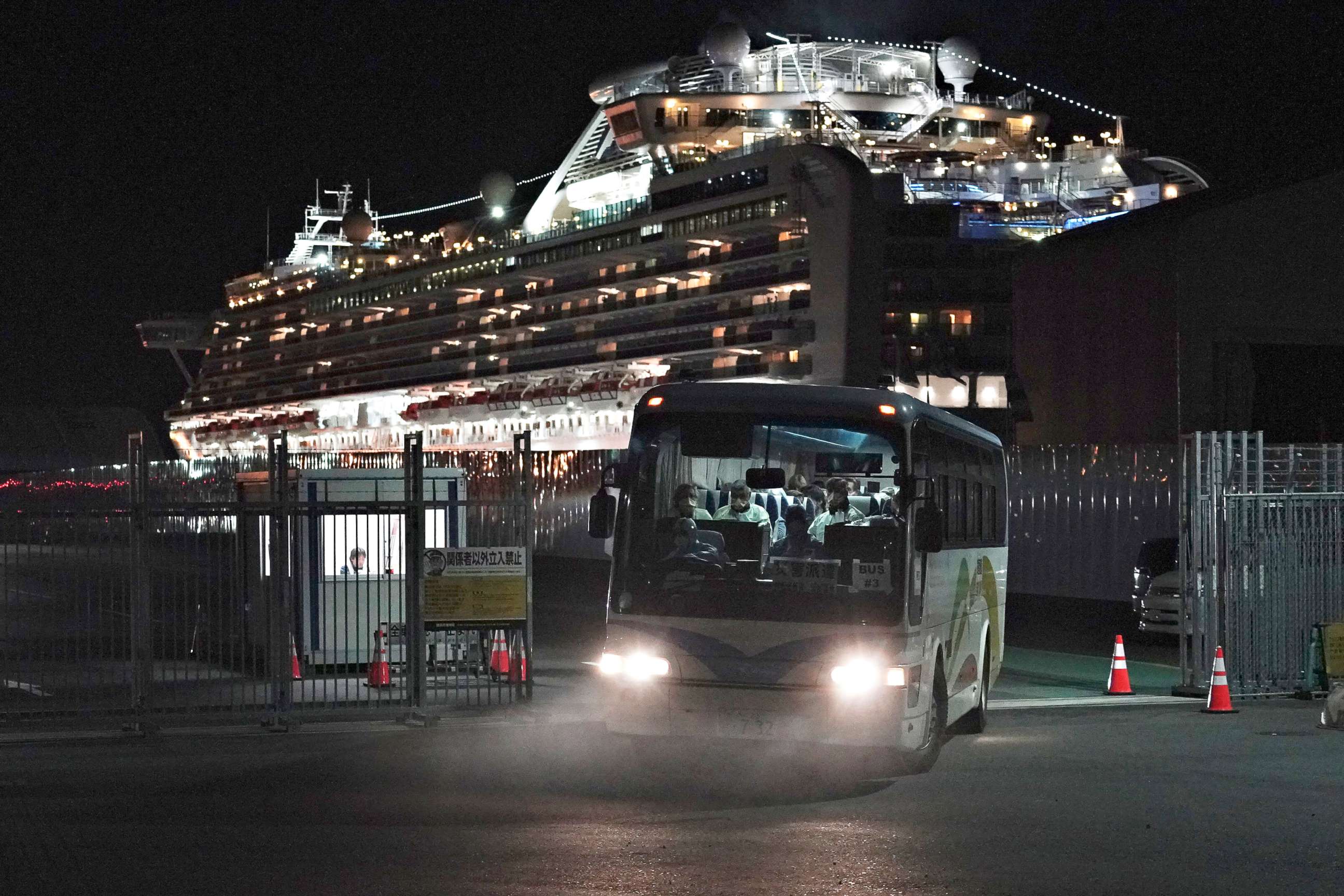 PHOTO: Buses carrying Australian passengers from the quarantined Diamond Princess cruise ship leave a port in Yokohama, near Tokyo, Feb. 19, 2020. 