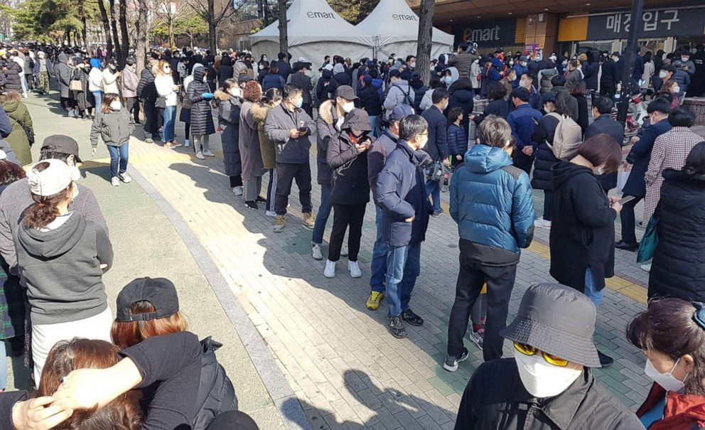 PHOTO: People wait in a line to buy masks at a market in Daegu, South Korea, Feb. 24, 2020.
