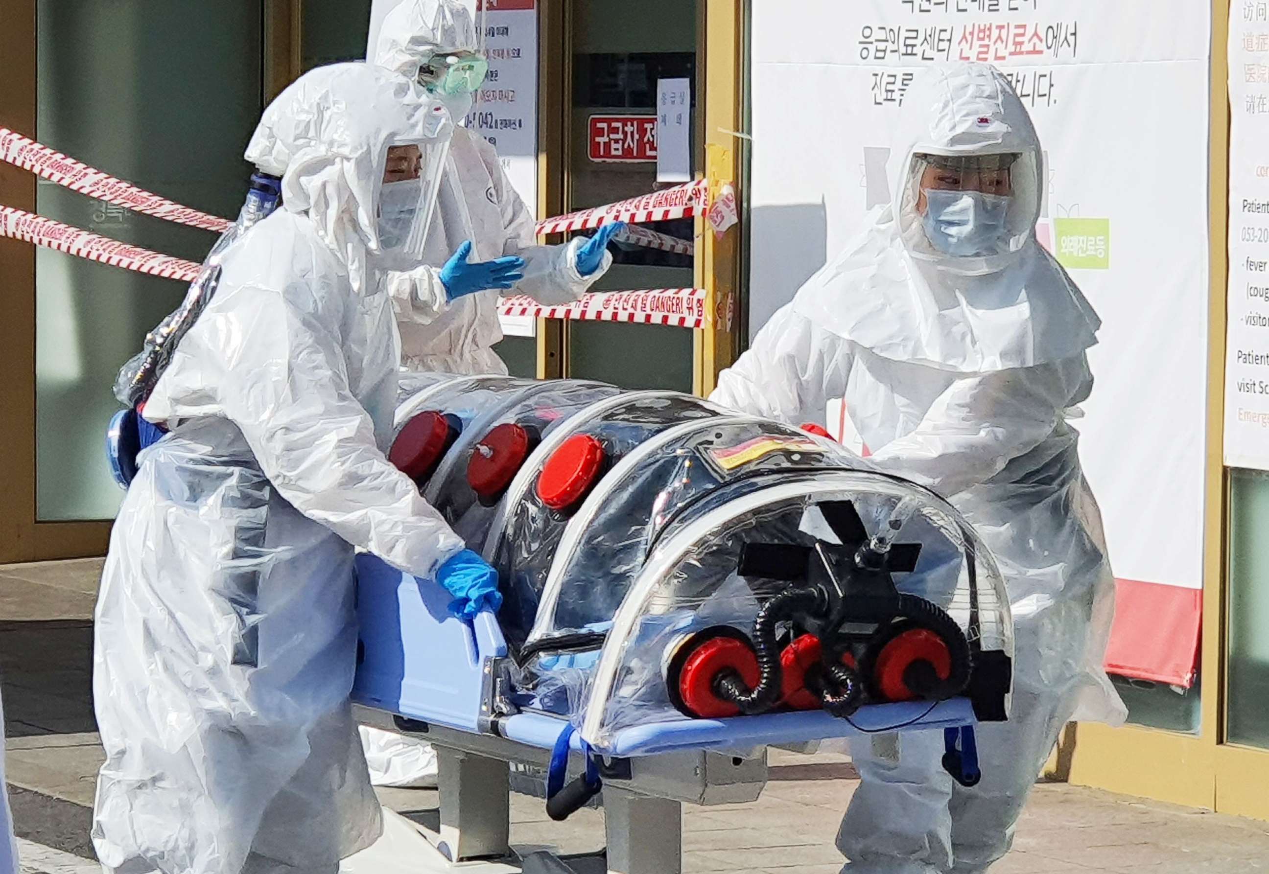 PHOTO:A patient suspected of carrying the new coronavirus, COVID-19, arrives at Kyungpook National University Hospital in Daegu, South Korea, Feb. 19, 2020.