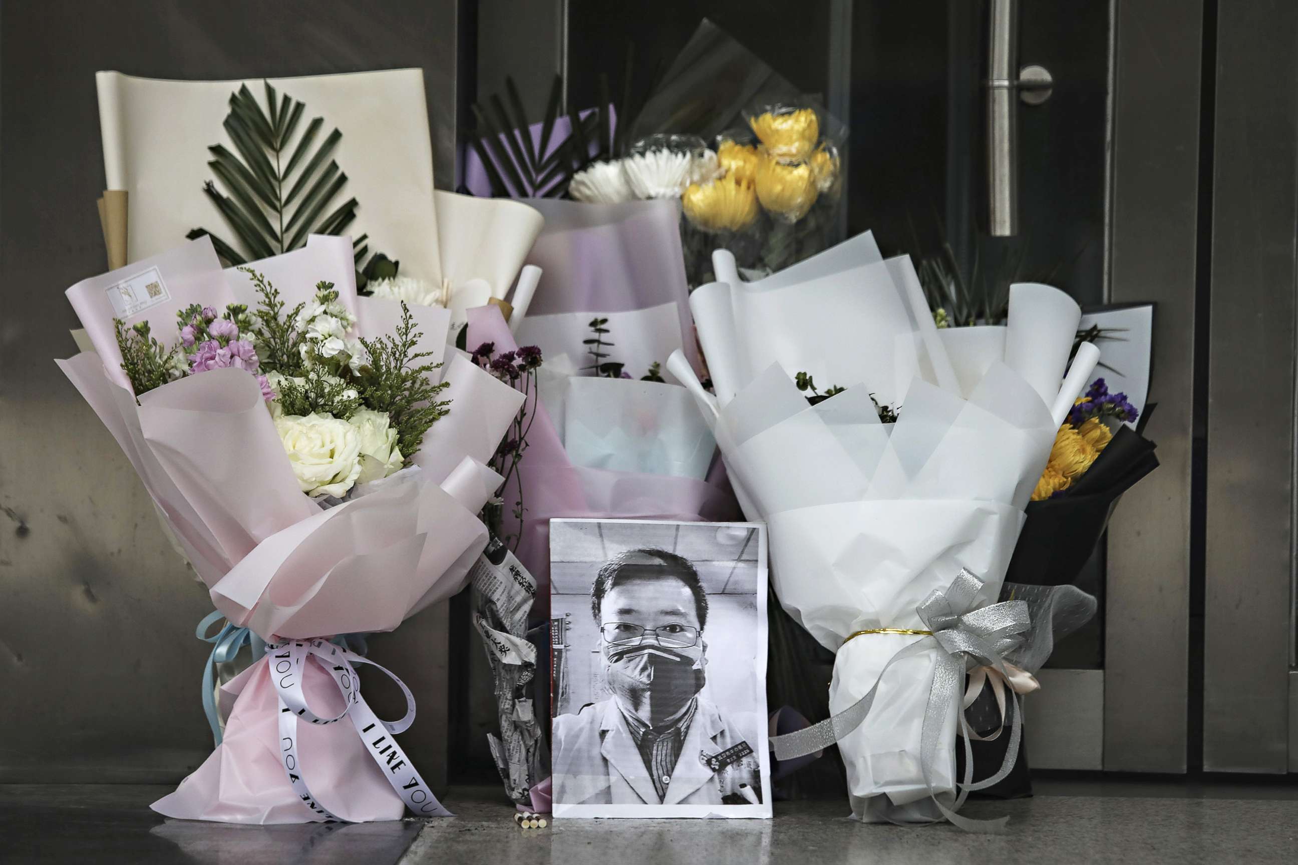 PHOTO: A portrait of Dr. Li Wenliang is left at Li's hospital in Wuhan, China, Feb. 7, 2020. 