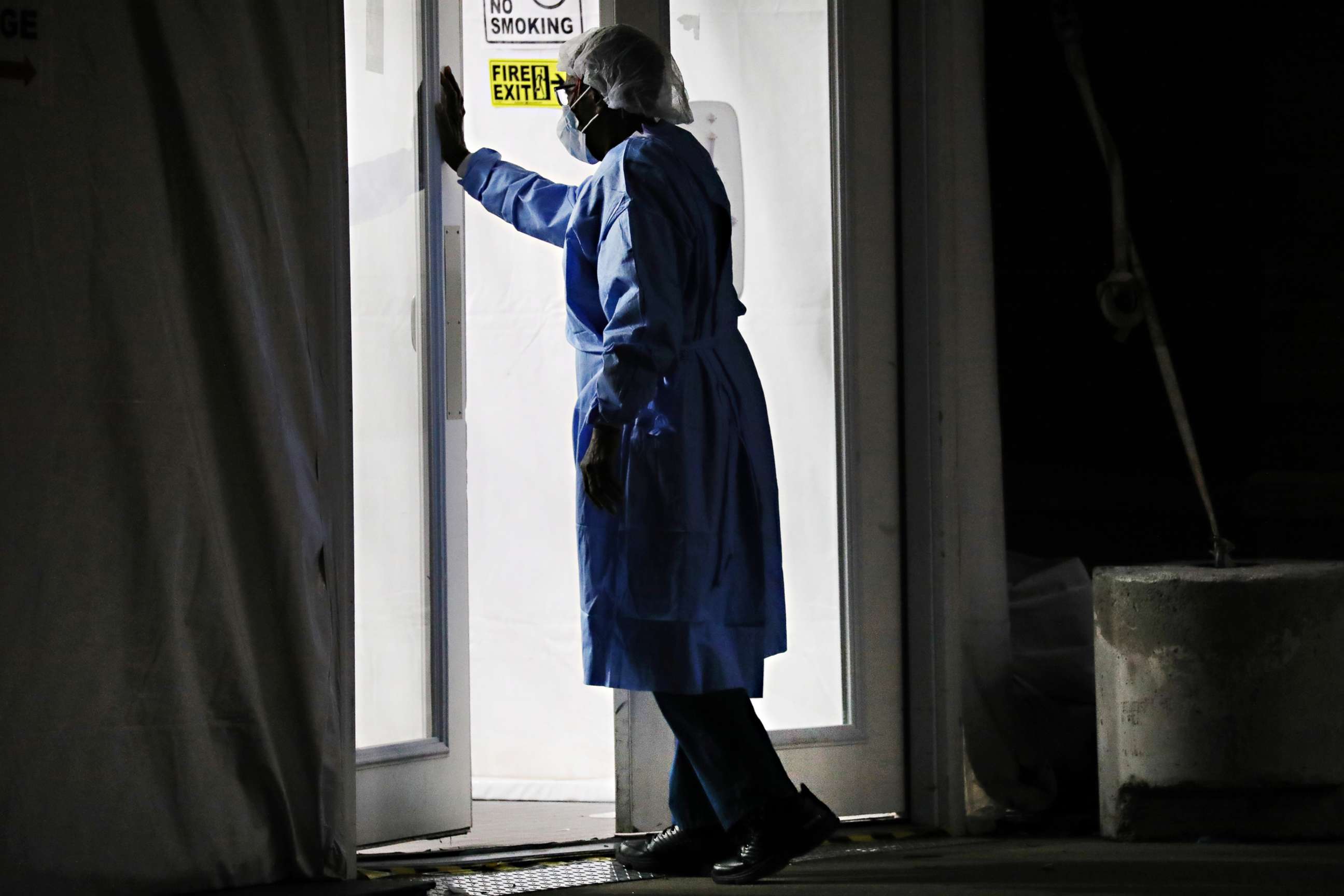 PHOTO: Medical worker on the night shift outside of a special coronavirus intake area at Maimonides Medical Center, on April 15, 2020, in the Borough Park neighborhood of the Brooklyn, New York.