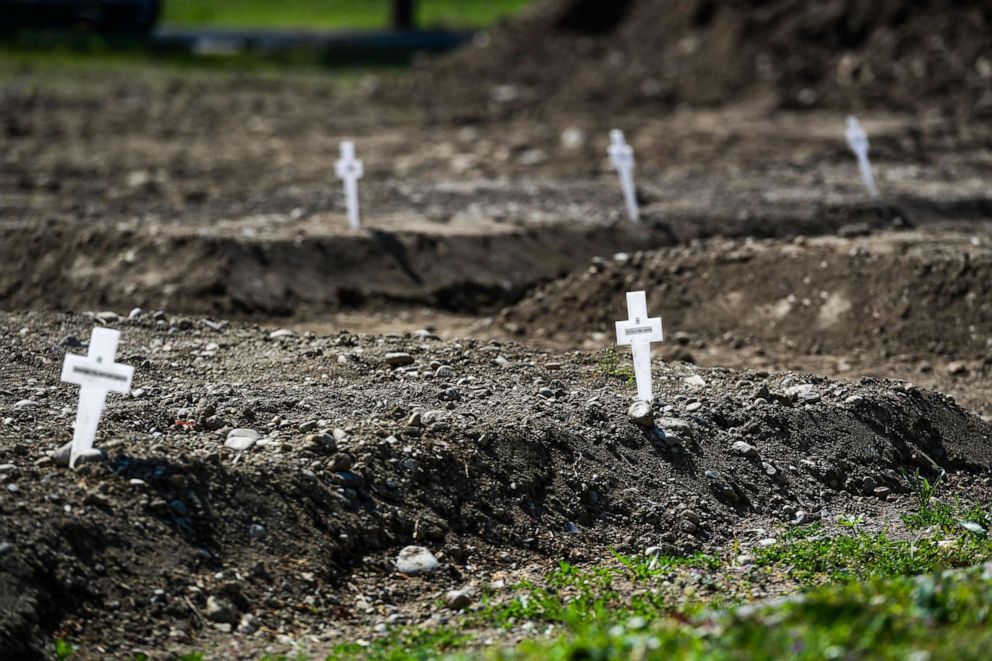 PHOTO: A view shows crosses in the so-called Campo 87 area where some 60 unclaimed bodies, of people who died from the novel coronavirus, have been buried so far by the municipality at the Maggiore cemetery in Milan, Italy, on April 23, 2020.