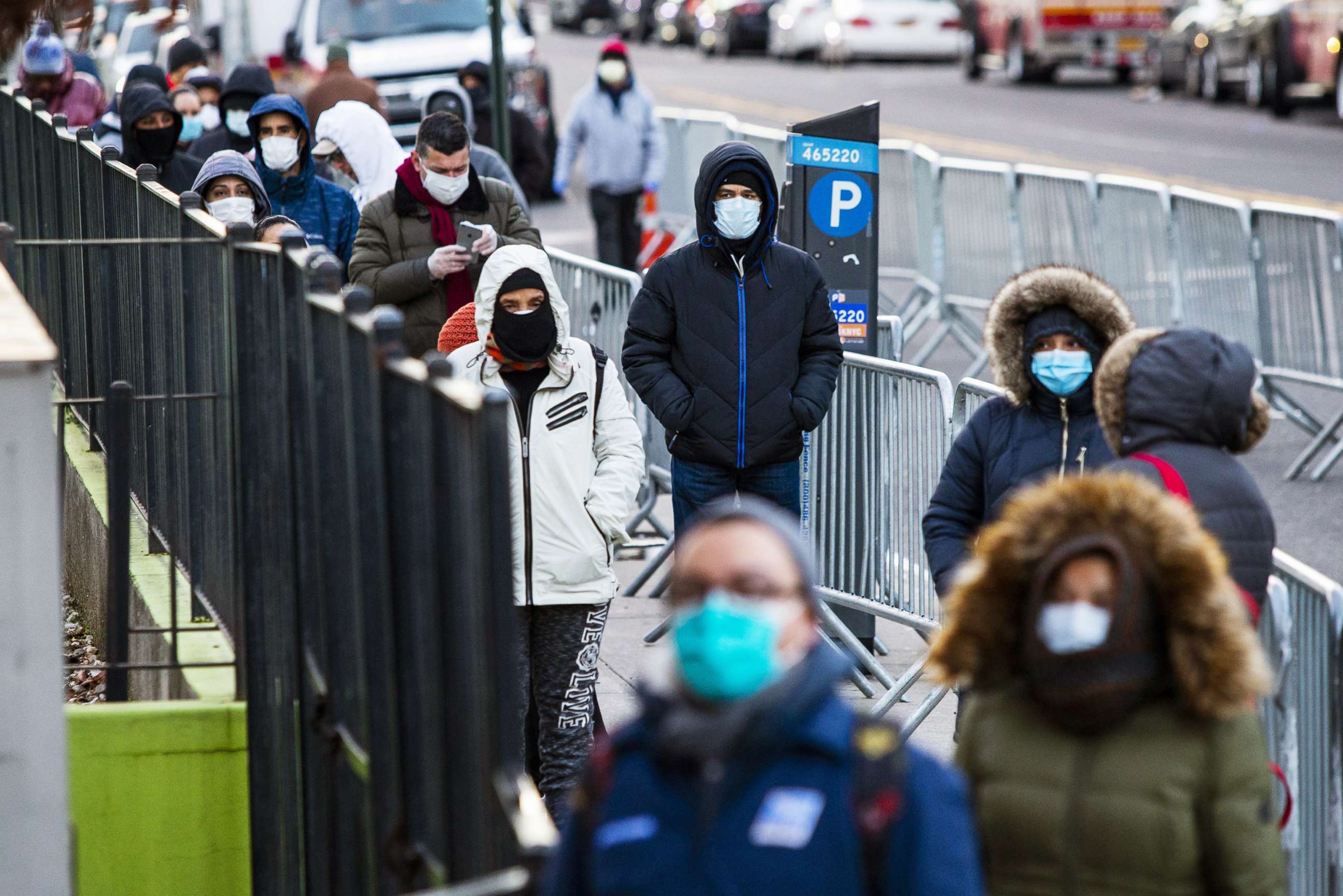 PHOTO: People line up to get a test at Elmhurst Hospital during the coronavirus outbreak, March 24, 2020 in the Queens borough of New York City.