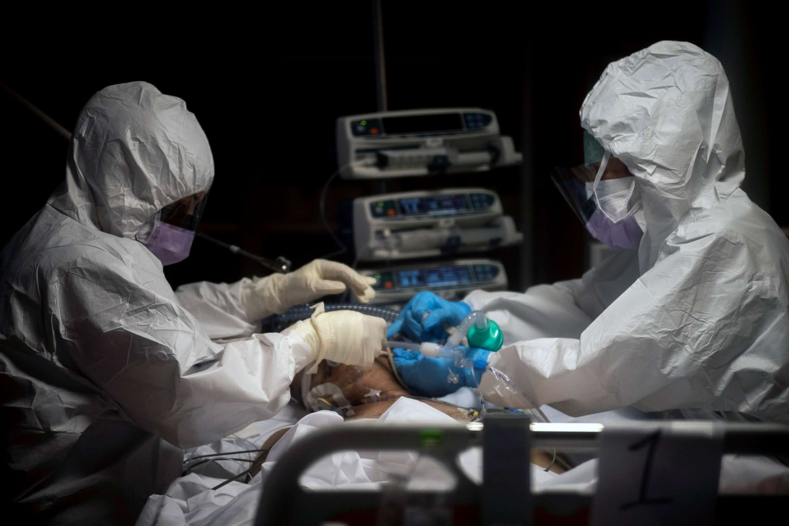 PHOTO: Doctors treat COVID-19 patients in an intensive care unit at the third Covid 3 Hospital (Istituto clinico CasalPalocco) during the Coronavirus emergency on March 26, 2020, in Rome.