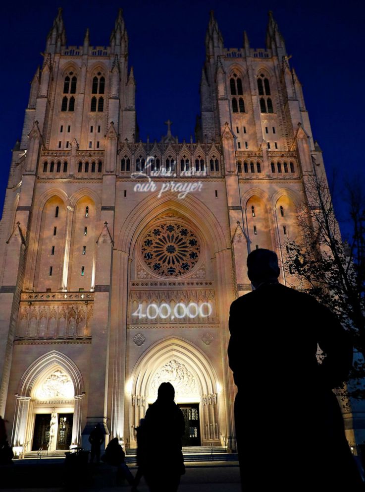 PHOTO:The Washington National Cathedral honors the 400,000 U.S. lives lost to COVID-19 with a light display and tolling the Bourdon Bell 400 times, once for every thousand lives lost on Jan. 19, 2021, in Washington, D.C.