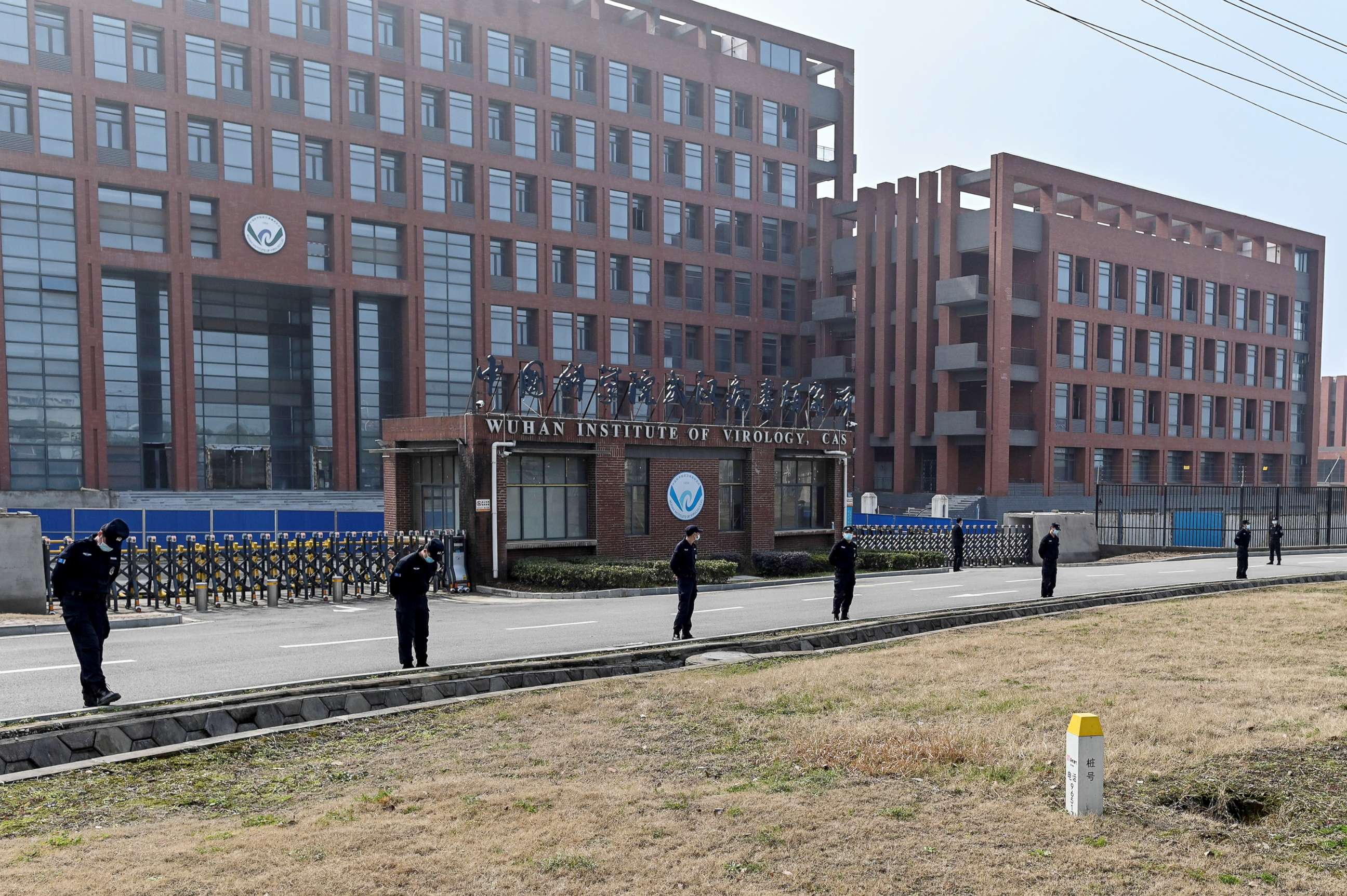 PHOTO: People stand outside of the Wuhan Institute of Virology in Wuhan, China, on Feb. 3, 2021.