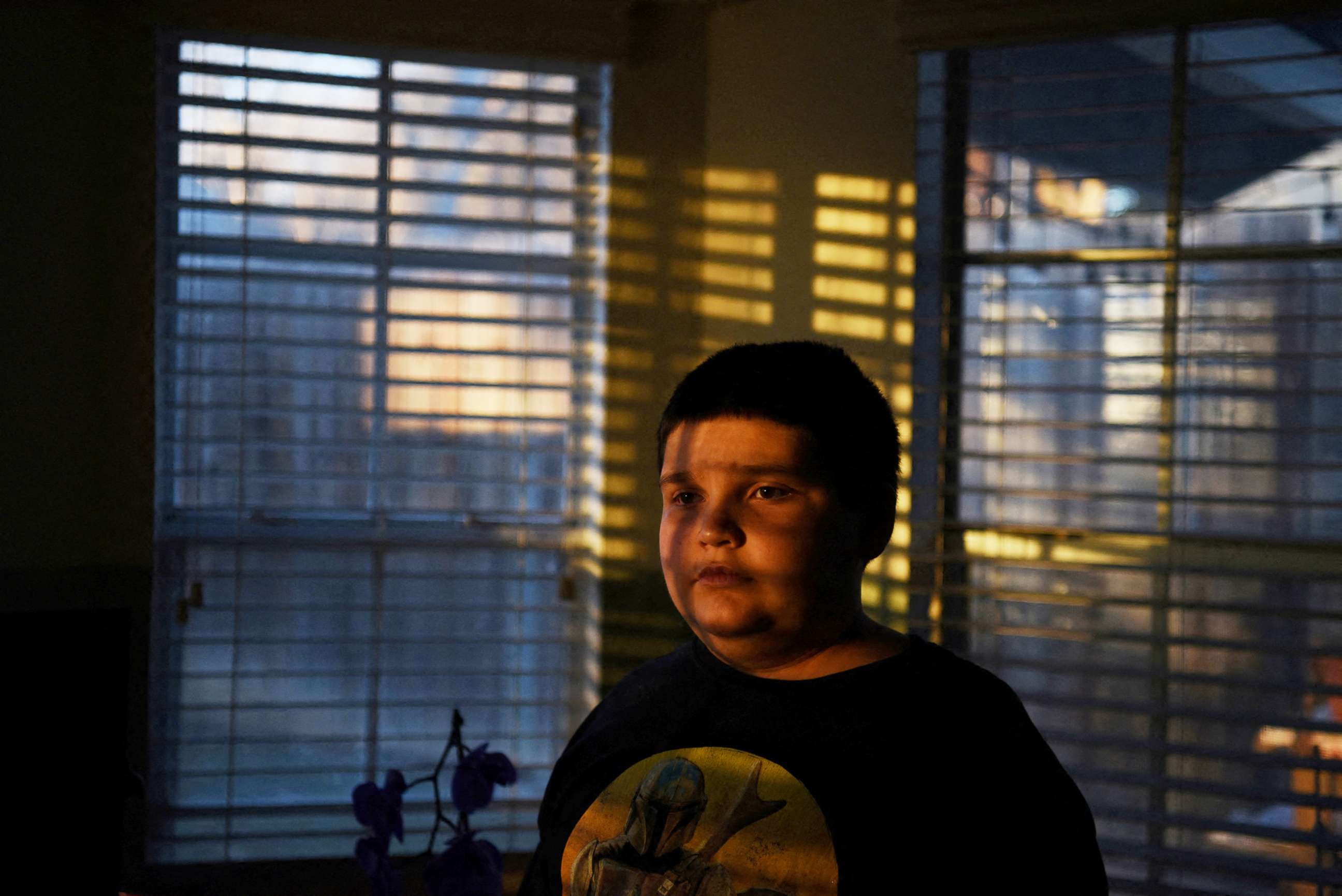 PHOTO: Aidan Garza, 12, poses for a portrait at home in Converse, Texas, Feb. 27, 2022.