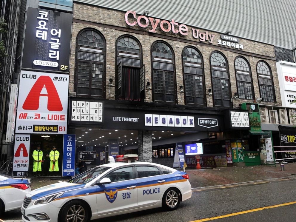 PHOTO: Police stand at the door to a nightclub in Gwangju, South Korea, Saturday, July 27, 2019. Members of the U.S. national water polo team were in a South Korean nightclub on Saturday when an internal balcony collapsed, killing at least two people.