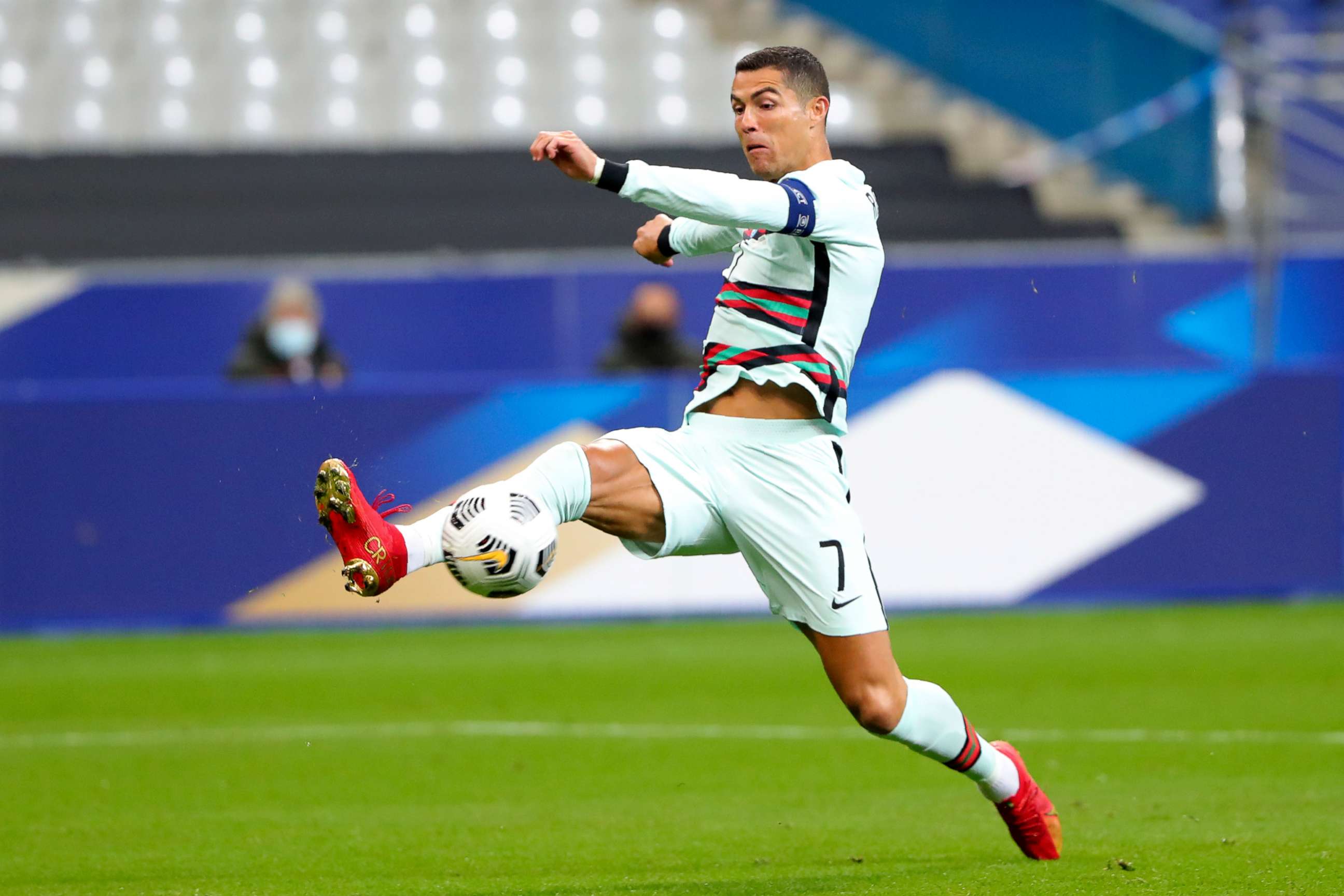 PHOTO: Portugal's Cristiano Ronaldo stretches for the ball during the UEFA Nations League soccer match between France and Portugal at the Stade de France in Saint-Denis, north of Paris, France, on Oct. 11, 2020.