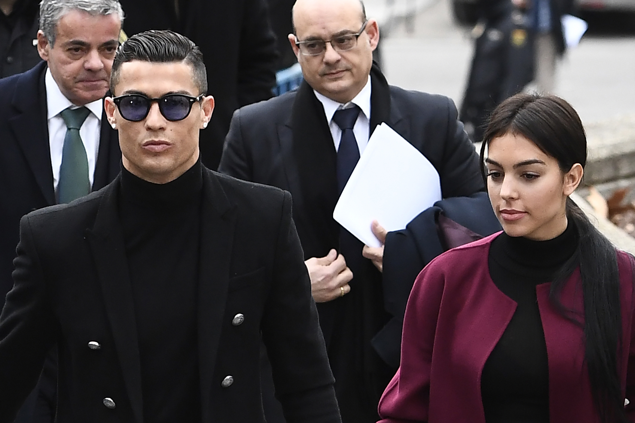 PHOTO: Juventus' forward and former Real Madrid player Cristiano Ronaldo arrives with his girlfriend Georgina Rodriguez to attend a court hearing for tax evasion in Madrid Jan. 22, 2019.