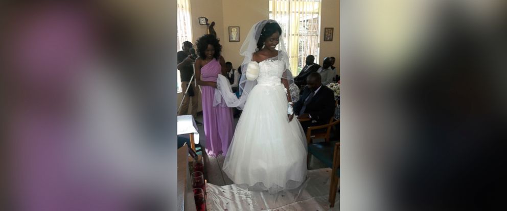 PHOTO: In this photo taken, May, 5, 2018, Zenele Ndlovu walks down the aisle on her wedding day at a hospital Chapel in Bulawayo, Zimbabwe.