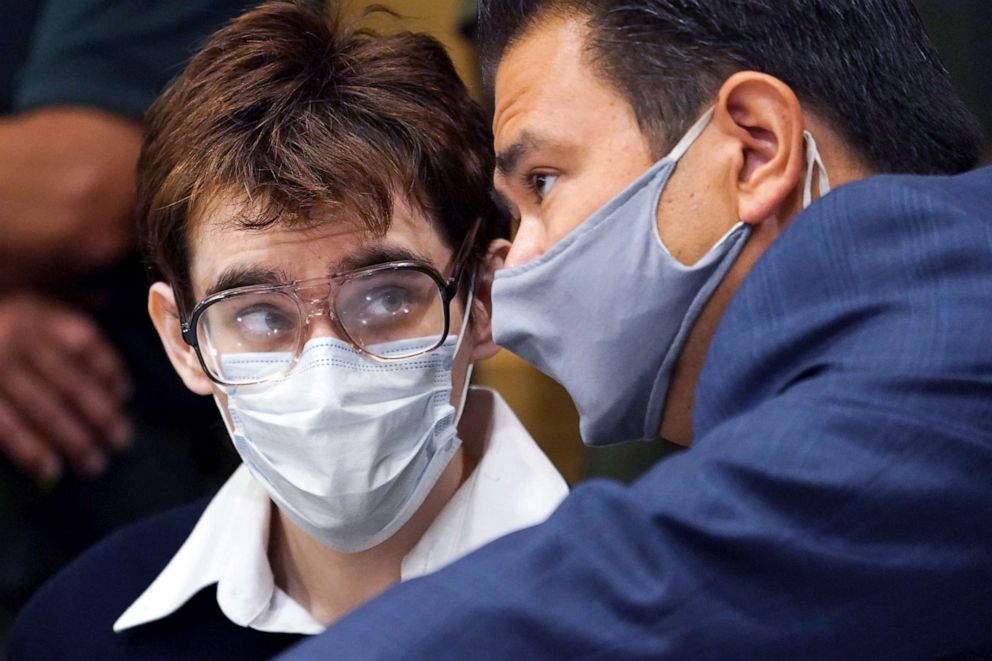 PHOTO: Parkland school shooter Nikolas Cruz looks at defense attorney David Wheeler at the Broward County Courthouse before pleading guilty on all four criminal counts for an attack on a Broward County jail guard, in Fort Lauderdale, Fla., Oct. 15, 2021. 