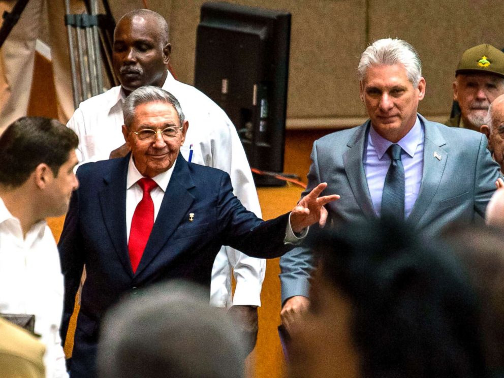 PHOTO: Cuban President Raul Castro (L) and First Vice-President Miguel Diaz-Canel (C) arrive for a National Assembly session that named the latter as the candidate to succeed Castro as president, in Havana, April 18, 2018.