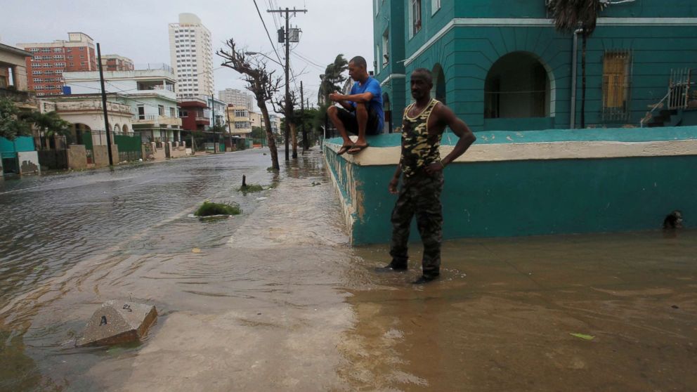 PHOTO: People are seen on a flooded street as Hurricane Irma turns toward the Florida Keys, in Havana, Cuba, Sept. 9, 2017.