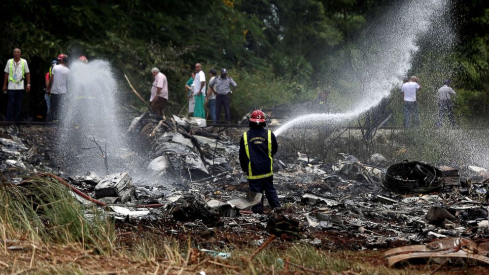 PHOTO: A firefighter works in the wreckage of a Boeing 737 plane that crashed in the agricultural area of Boyeros, around 20 km (12 miles) south of Havana, shortly after taking off from Havana's main airport in Cuba, May 18, 2018.