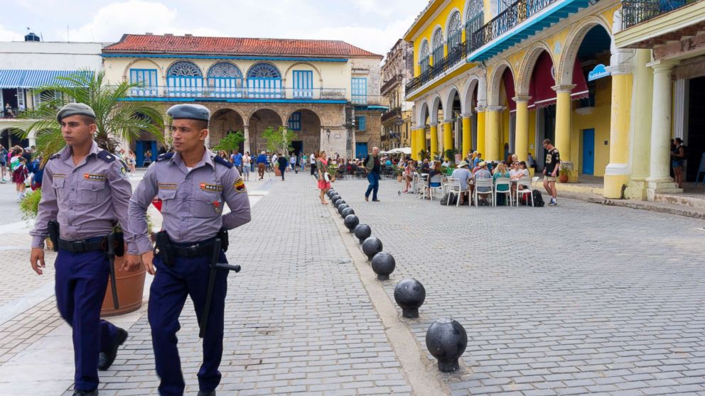 Cuban policemen patrol the Old Plaza, March 15, 2017, in Old Havana Cuba.