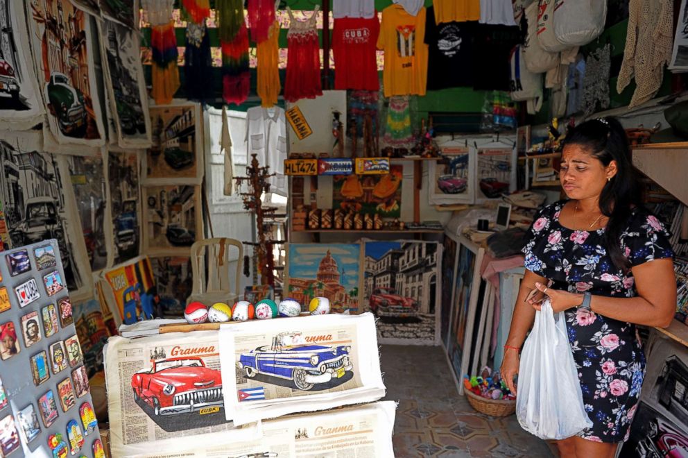 PHOTO: A woman looks at handcraft products in a private shop in Havana, March 28, 2018.