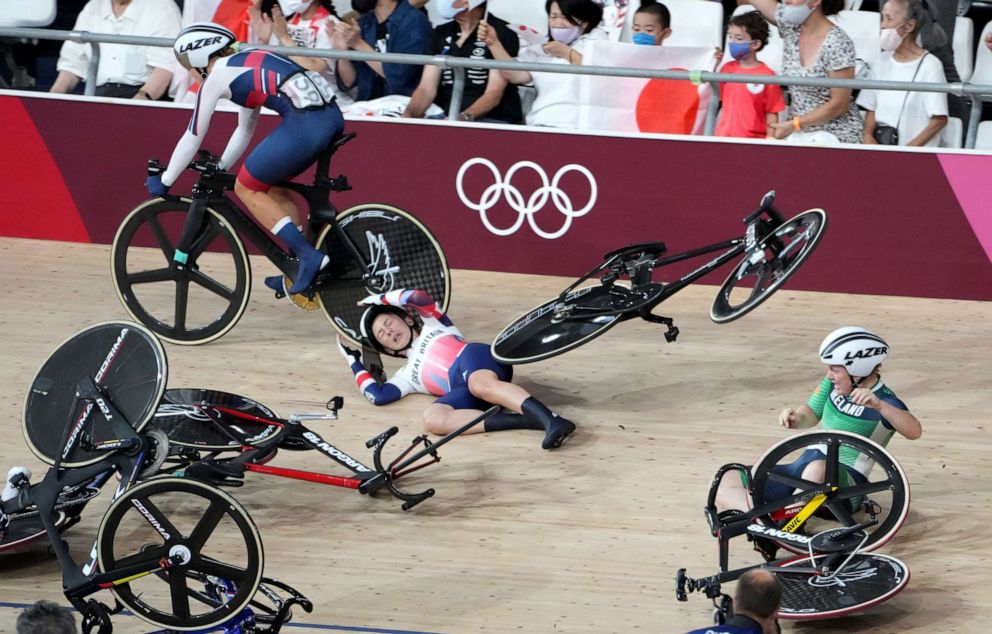 PHOTO: Laura Kenny of Great Britain and Emily Kay of Ireland crash in the Women's Omnium Scratch Race 1/4 during the Track Cycling events of the Tokyo 2020 Olympic Games at the Izu Velodrome in Ono, Shizuoka, Japan, Aug. 8, 2021.