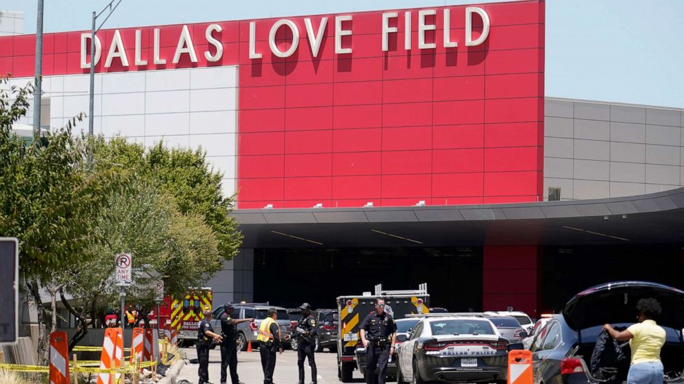 Woman shot by police after firing handgun inside Dallas Love Field ...