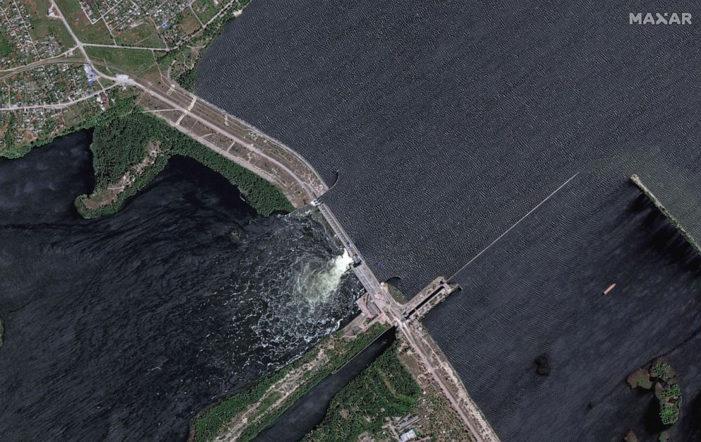 PHOTO: Water flows through a breach on the Nova Khakovka dam in south Ukraine, June 5, 2023.