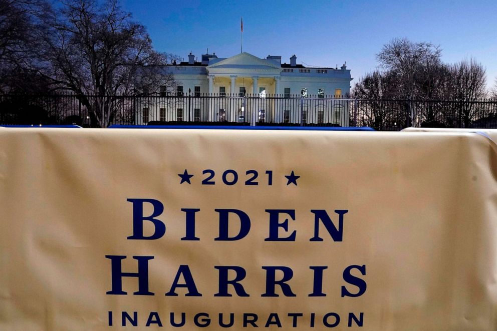 PHOTO: A Biden-Harris banner hangs in front of the White House Jan. 19, 2021 in Washington, DC, ahead of the 59th inaugural ceremony for President-elect Joe Biden and Vice President-elect Kamala Harris. 
