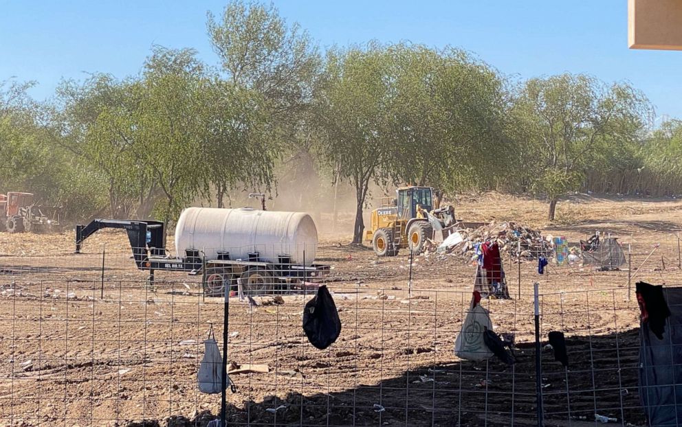 PHOTO: Bulldozers cleared the makeshift camp with migrants under the international bridge in Del Rio, Texas after people were put on buses to a processing facility, Sept. 24, 2021.