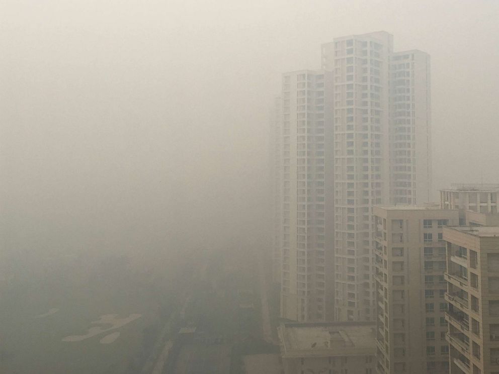 PHOTO: Residential buildings are seen in smog in Noida on the outskirts of New Delhi, India, Nov. 5, 2018.