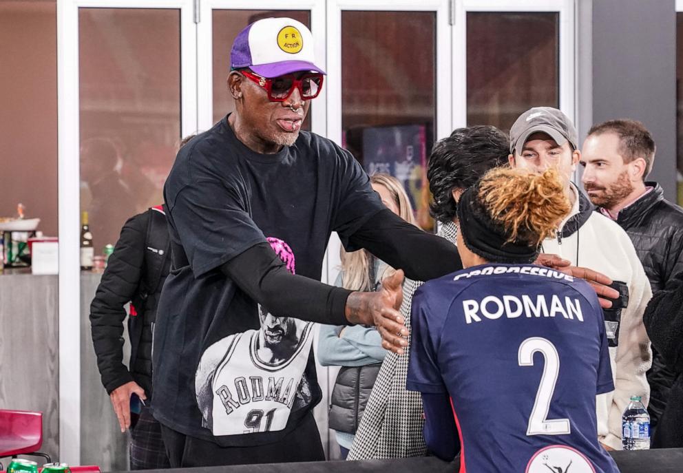 PHOTO: Washington Spirit forward Trinity Rodman with her father basketball legend Dennis Rodman after a game between North Carolina Courage and Washington Spirit at Audi Field, Nov. 7, 2021, in Washington.