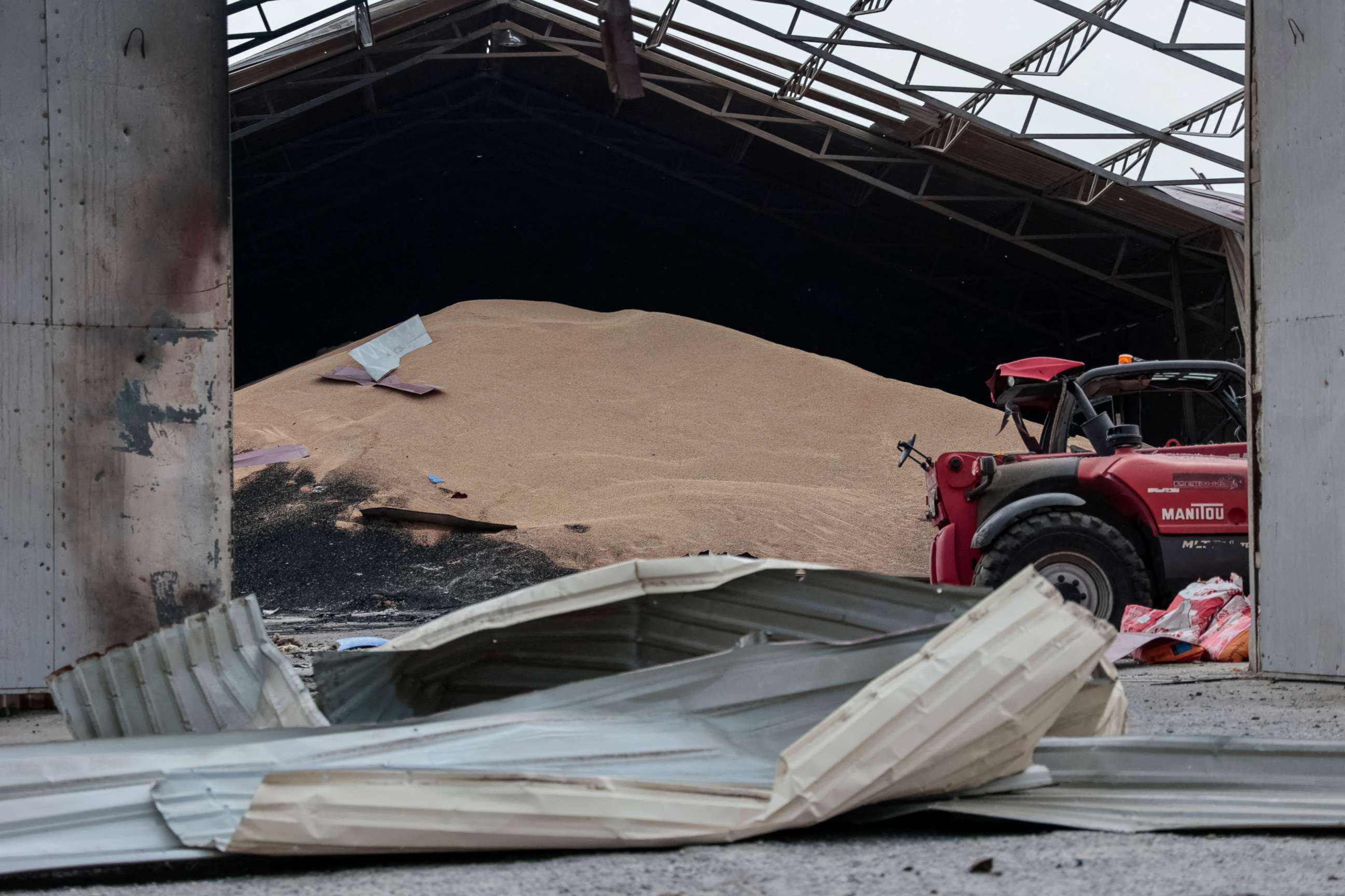 PHOTO: Seeds are seen in a destroyed grain silo, after it was shelled repeatedly amid Russia's invasion of Ukraine, in Donetsk Oblast, eastern Ukraine, on May 31, 2022.