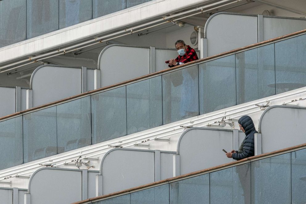 PHOTO: People stand on balconies on the Diamond Princess cruise ship while it is docked at Daikoku Pier in Yokohama, Japan, Feb. 7, 2020.