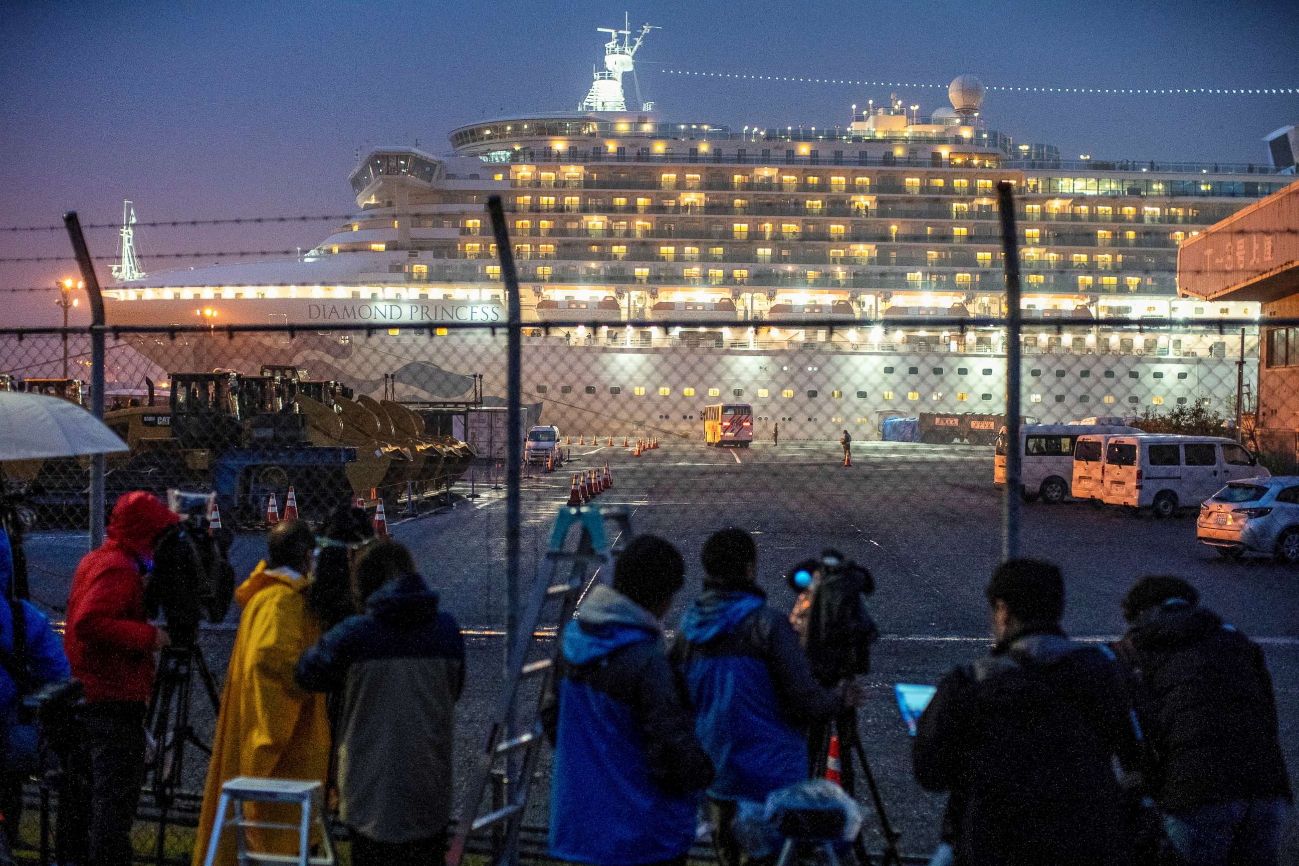 PHOTO: A bus arrives near the cruise ship Diamond Princess, where dozens of passengers were tested positive for coronavirus, at Daikoku Pier Cruise Terminal in Yokohama, south of Tokyo, Japan, February 16, 2020. 