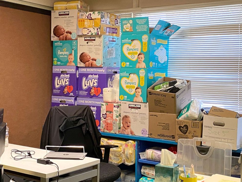 PHOTO: Diapers for new refugees are stacked behind a desk at the Lutheran Immigration and Refugee Service's (LIRS) newly-launched resettlement office at Peach Lutheran Church in Alexandria, Va., Dec. 16, 2021.