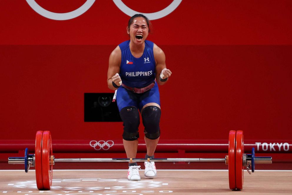 PHOTO: Hidilyn Diaz of the Philippines celebrates after a lift on July 26, 2021 in Tokyo.
