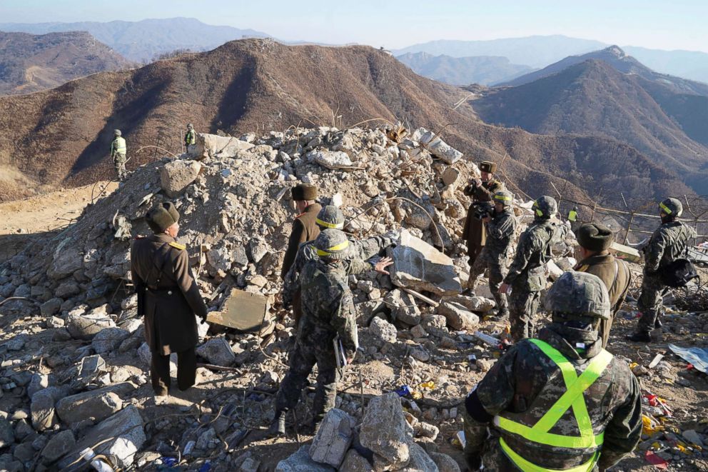 PHOTO: South Korean and North Korean army soldiers inspect a dismantled North Korean guard post inside the Demilitarized Zone (DMZ) in the central section of the inter-Korean border in Cheorwon, North Korea, Dec. 17, 2018.