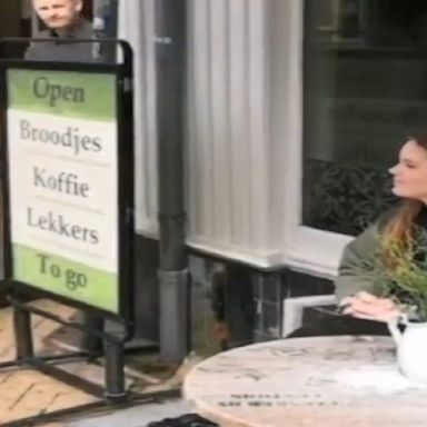 A café in the Netherlands showcases how to properly—and improperly—apply social distancing measures while serving customers.