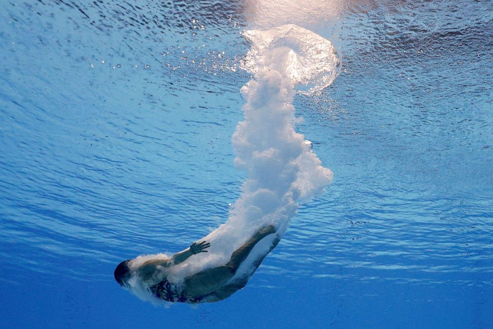 PHOTO: A diver trains at the Tokyo Aquatics Centre, Tokyo, Japan on July 21, 2021.