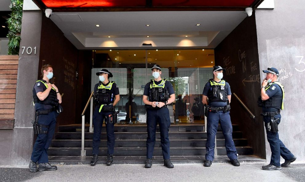 PHOTO: Police stand guard at a government detention center where tennis champion Novak Djokovic is reported to be staying in Melbourne on Jan. 7, 2022, after Australia said it had cancelled the entry visa for Djokovic.