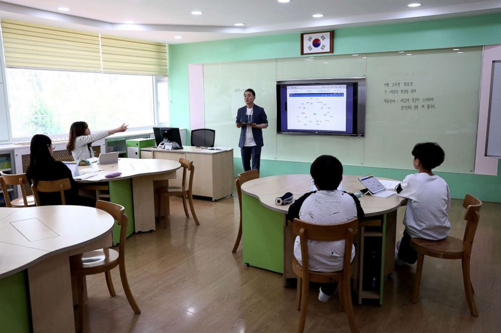 PHOTO: South Korean children take a class at the Taesung elementary school, April 24, 2018, in Paju, South Korea.