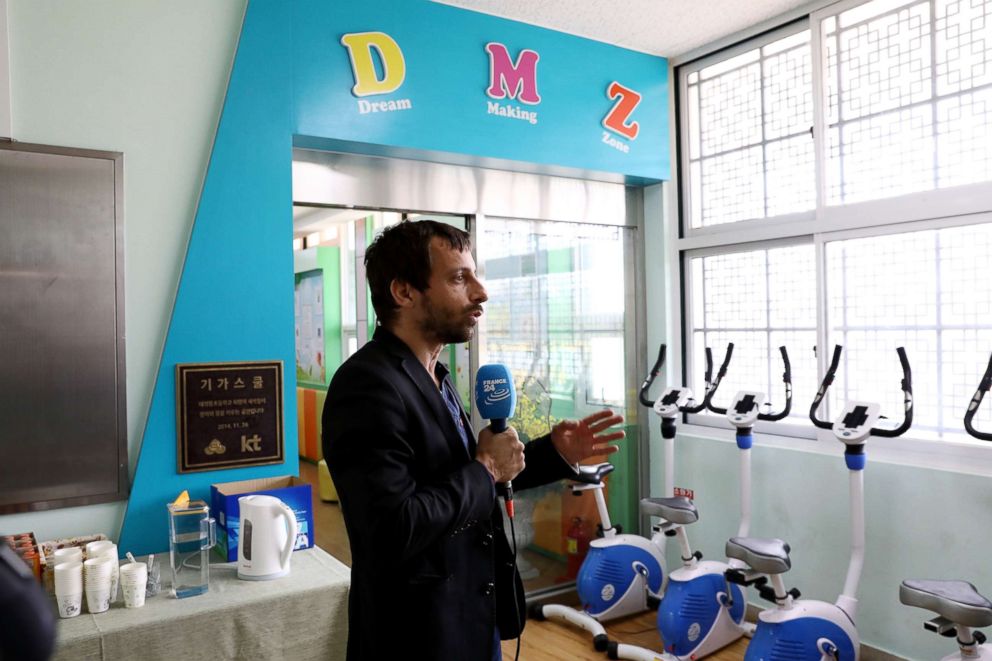 PHOTO: A reporter films at the Taesung elementary school, April 24, 2018, in Paju, South Korea.