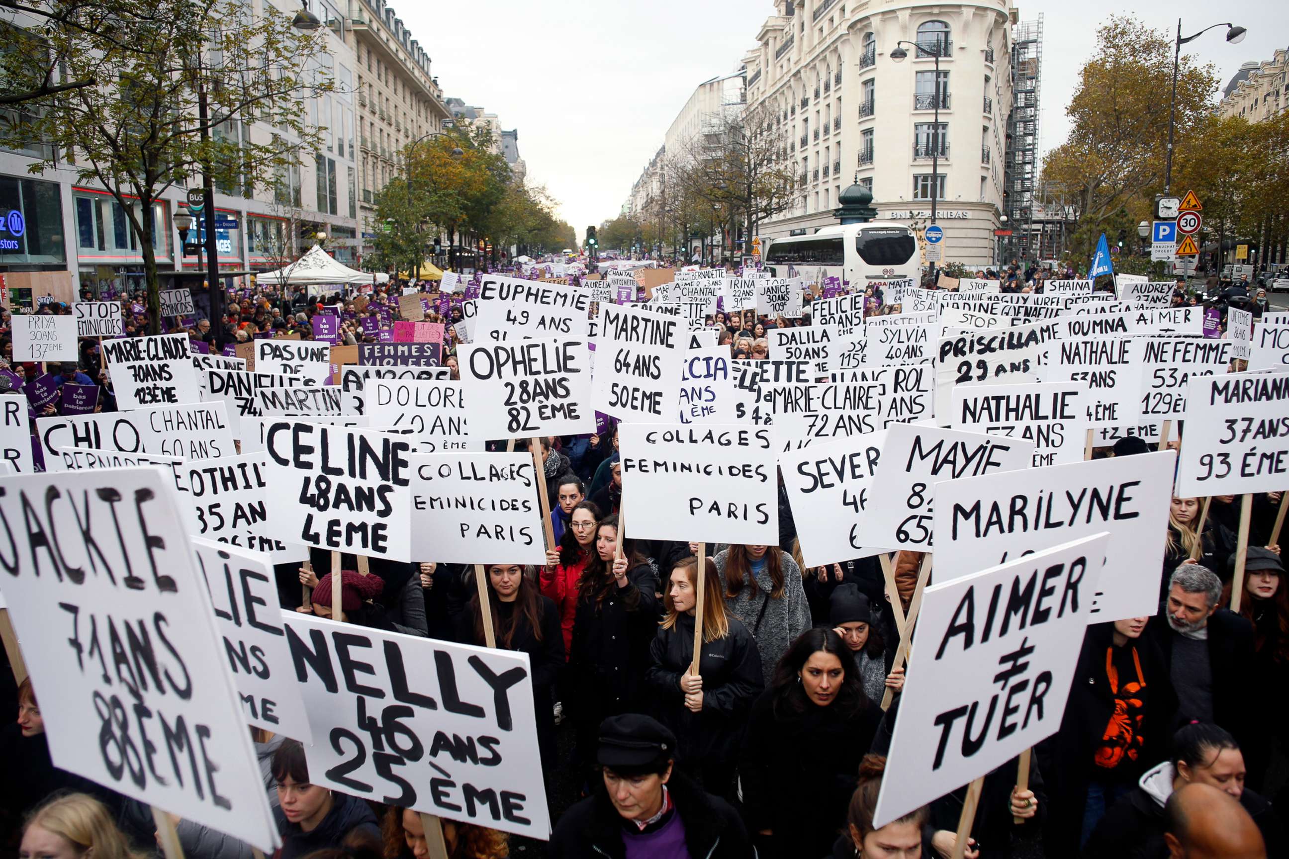 PHOTO: Women hold placards with the names of the women killed by their husband since the beginning of the year, as they march against domestic violence, in Paris, Nov, 23, 2019.