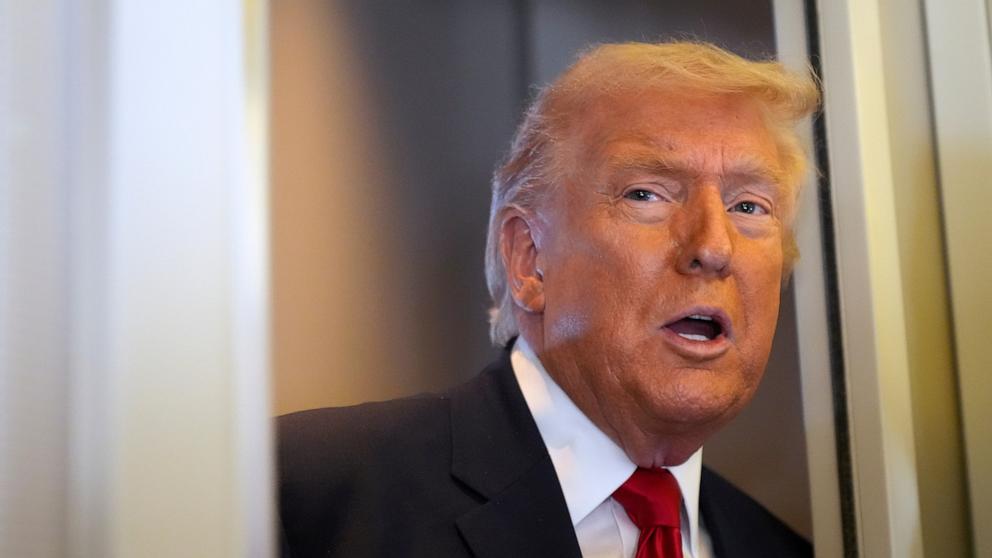 PHOTO: President Donald Trump speaks to reporters while traveling aboard Air Force One en route from Dover Air Force Base, Del., to Miami, March 7, 2026.