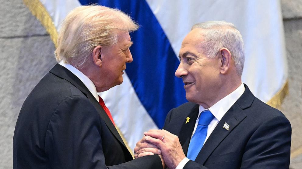 PHOTO: President Donald Trump talks with Israel's Prime Minister Benjamin Netanyahu at the Knesset, Israel's parliament, Oct. 13, 2025, in Jerusalem.