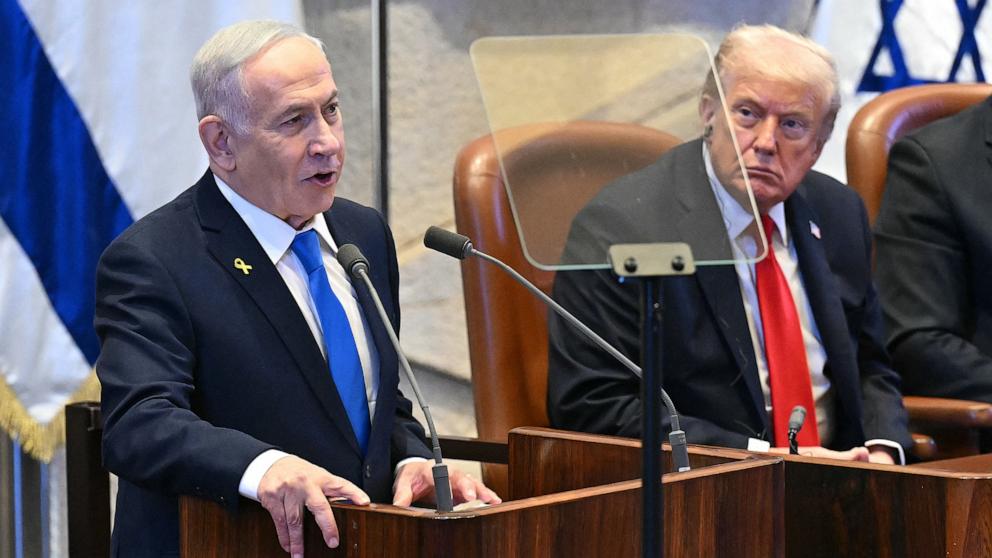 PHOTO: President Donald Trump listens to Israeli Prime Minister Benjamin Netanyahu as he addresses the Israeli parliament, the Knesset, in Jerusalem, October 13, 2025.