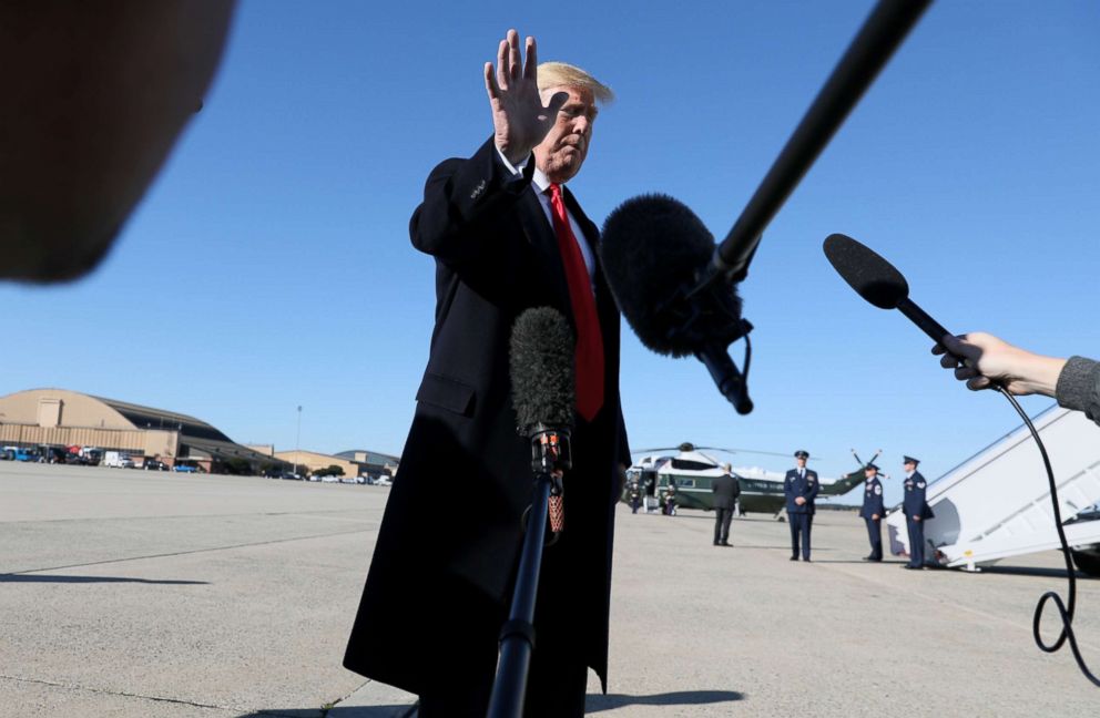 PHOTO: President Donald Trump waves off further questions as he heads to board Air Force One after talking to reporters about journalist Jamal Khashoggi's disappearance while departing for travel to Montana from Joint Base Andrews, Md., Oct. 18, 2018.