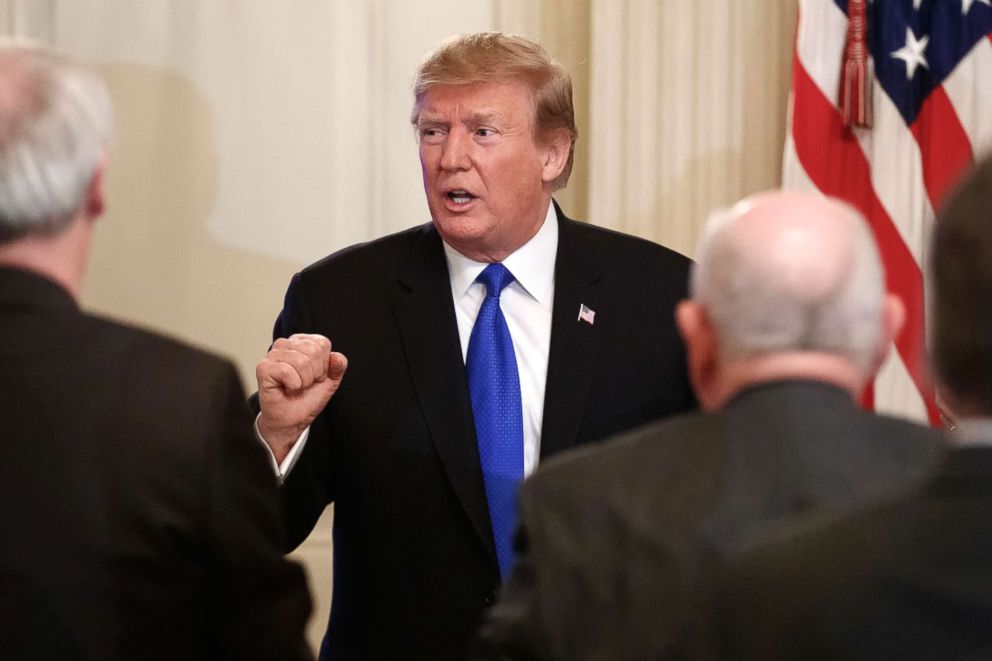 PHOTO: President Donald Trump greets people as he leaves the State Dining Room of the White House on Feb. 25, 2019, after speaking at the 2019 White House Business Session with Our Nation's Governors.