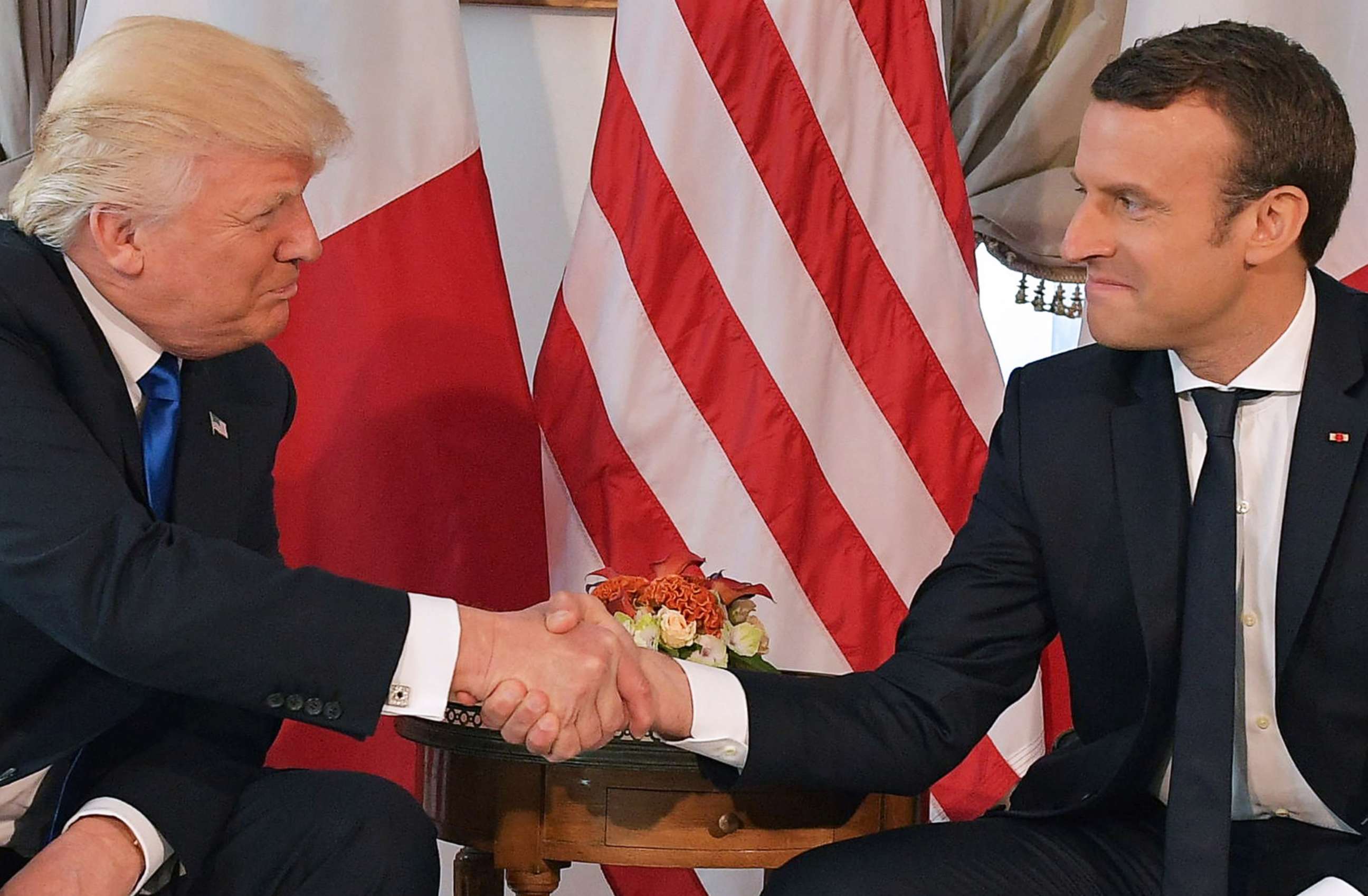 PHOTO: President Donald Trump and French President Emmanuel Macron shake hands on the sidelines of the NATO summit, in Brussels, May 25, 2017. 
