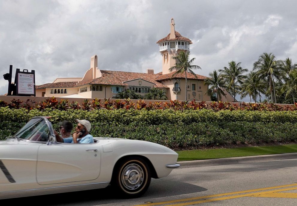 PHOTO: A car passes in front of former President Donald Trump's Mar-a-Lago resort in Palm Beach, Fla., Feb. 11, 2022.